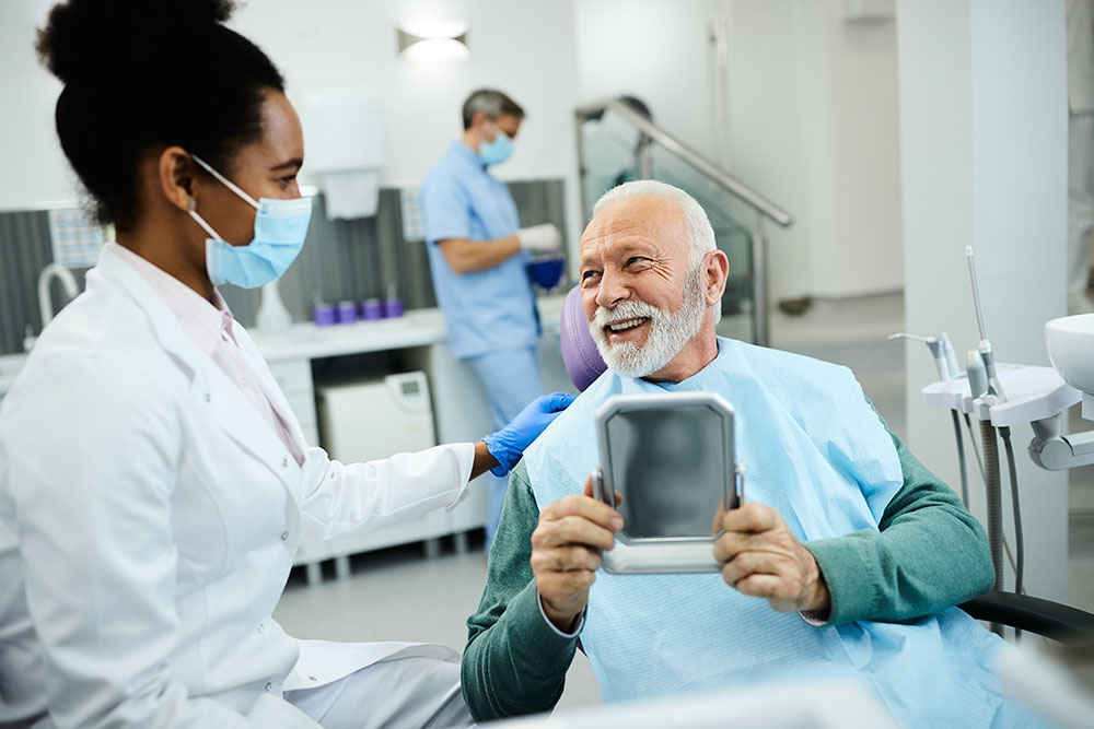 Happy-man-after-kenmar-dental-visit Happy-man-after-kenmar-dental-visit