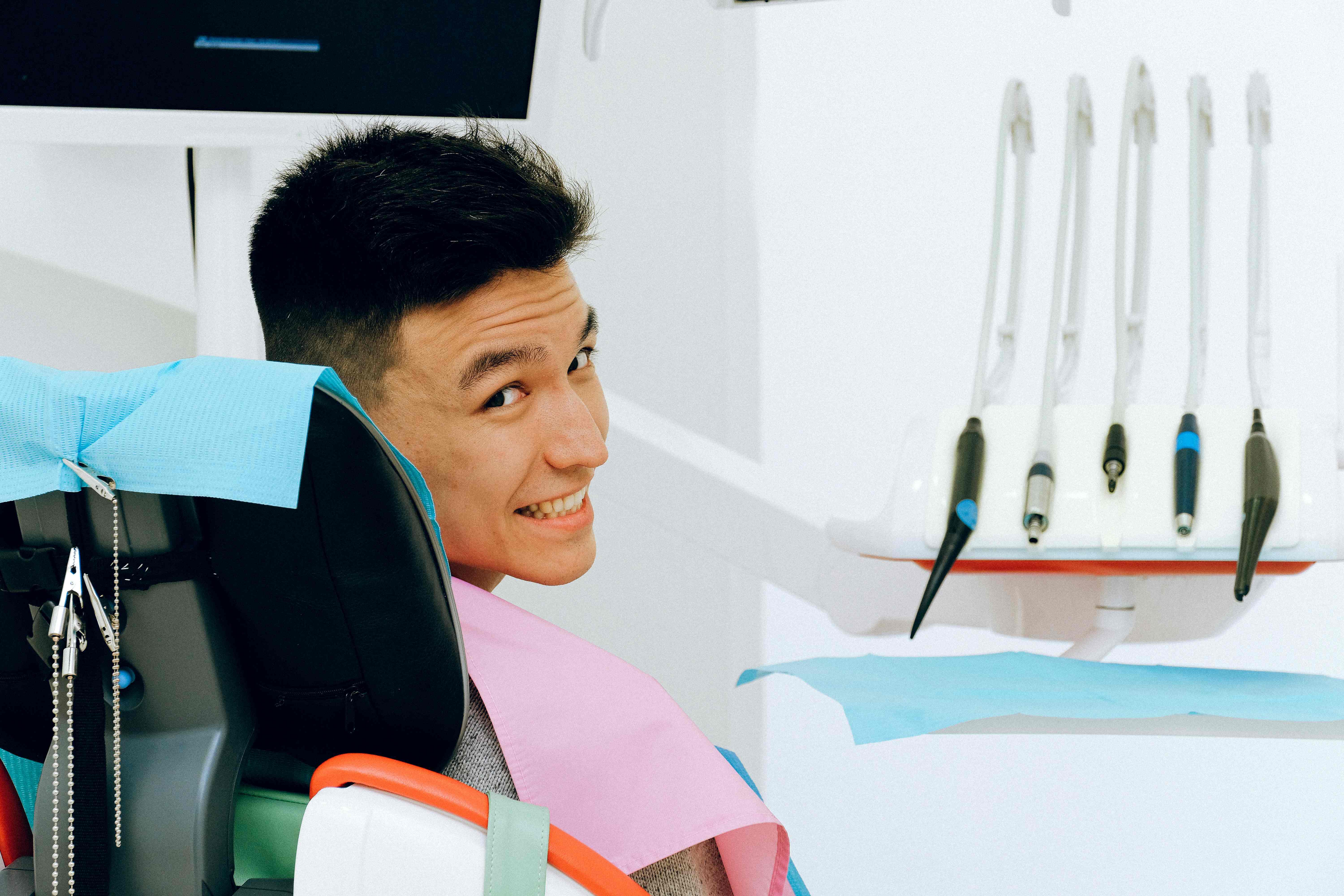 Patient_Smiling_in_Dental_Chair Patient_Smiling_in_Dental_Chair
